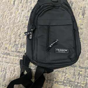 Fashion Instinct Water Resistant Crossbody Sling Bag with Headphone Hole